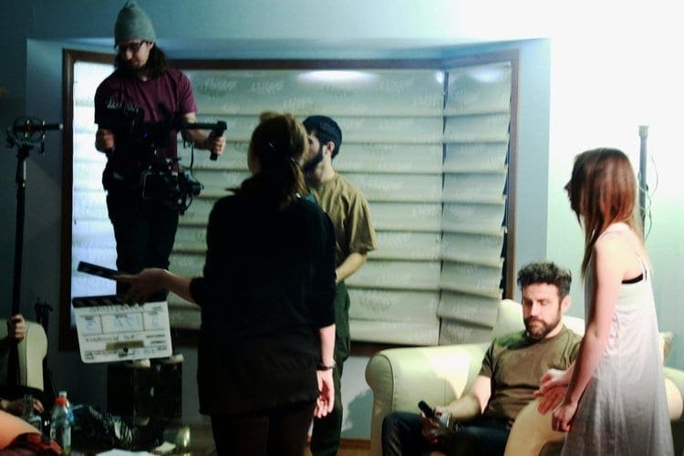 A still from the set of the short film Apparitions. Film crew prepping for a shot.