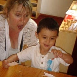 showing grande mamaw what he does at school
