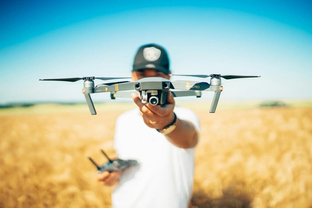 How to Master Drone Cinematography: A Filmmaker's Guide to Stunning Aerial Shots In 2025 2 Hold Drone