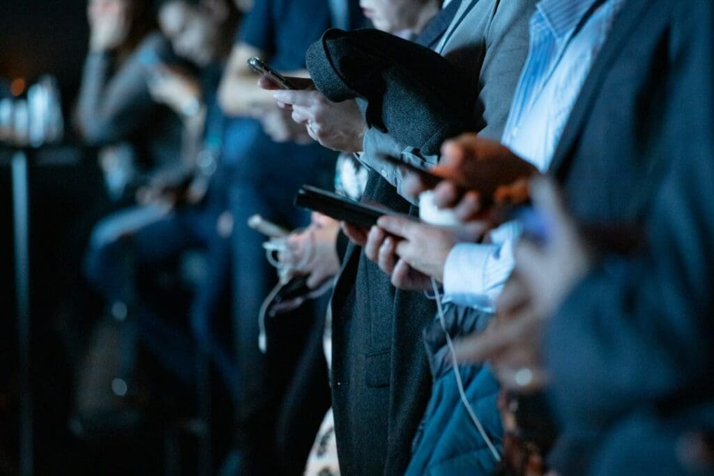 How to Master Independent Film Marketing on Social Media: A Filmmaker's Guide 2 People On Phones