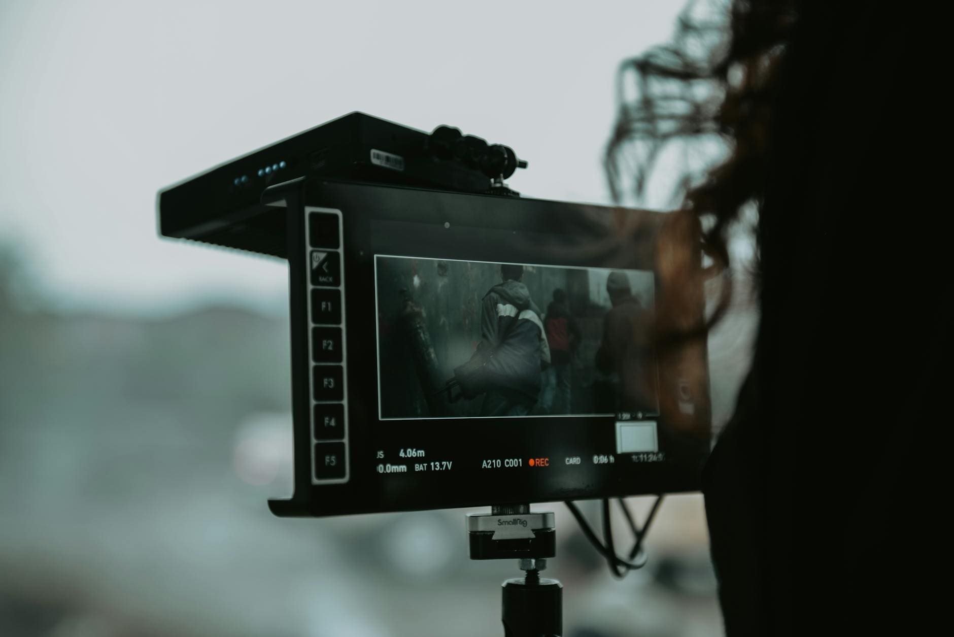 What Does a Script Supervisor Do? Salary, Skills, and How to Break In 2 film set monitor director