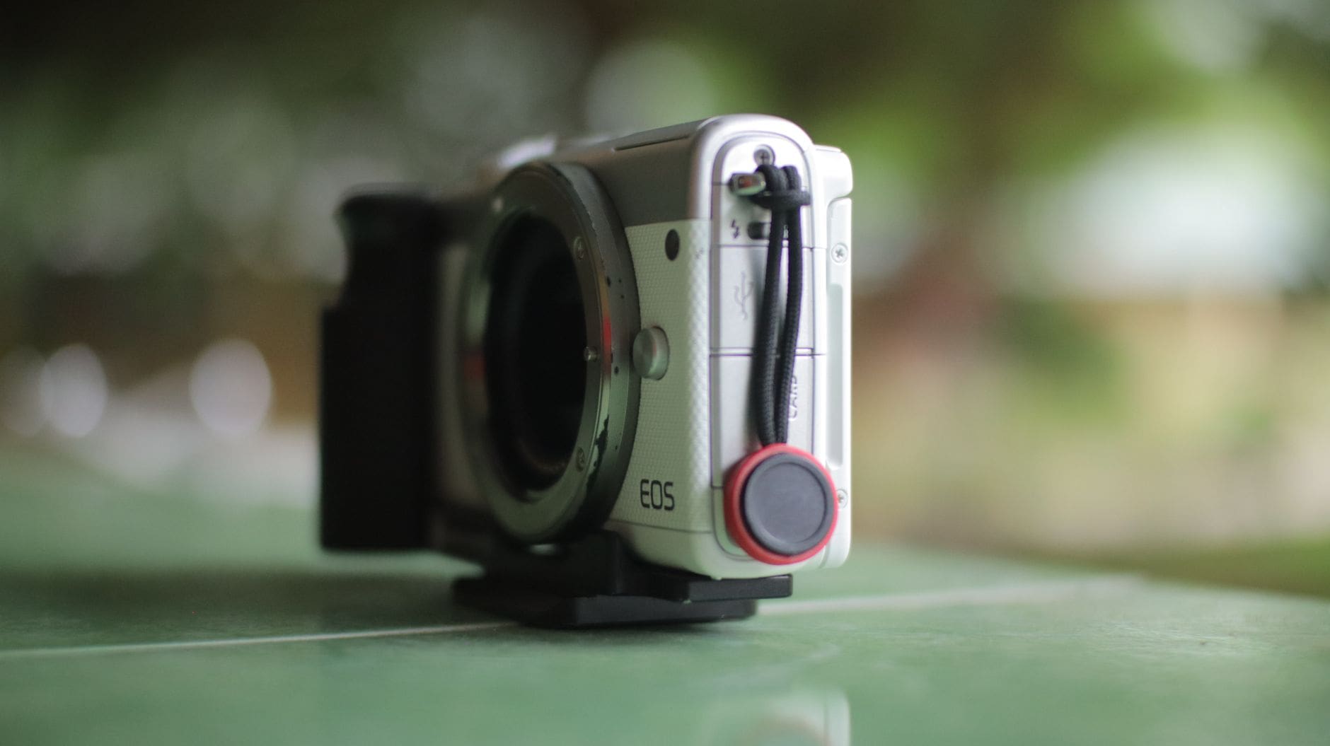 Best Camera for Filmmaking on a Budget in 2026: Sony ZV-E10 II vs Blackmagic Pocket 6K vs Canon R50 1 compact mirrorless camera close up
