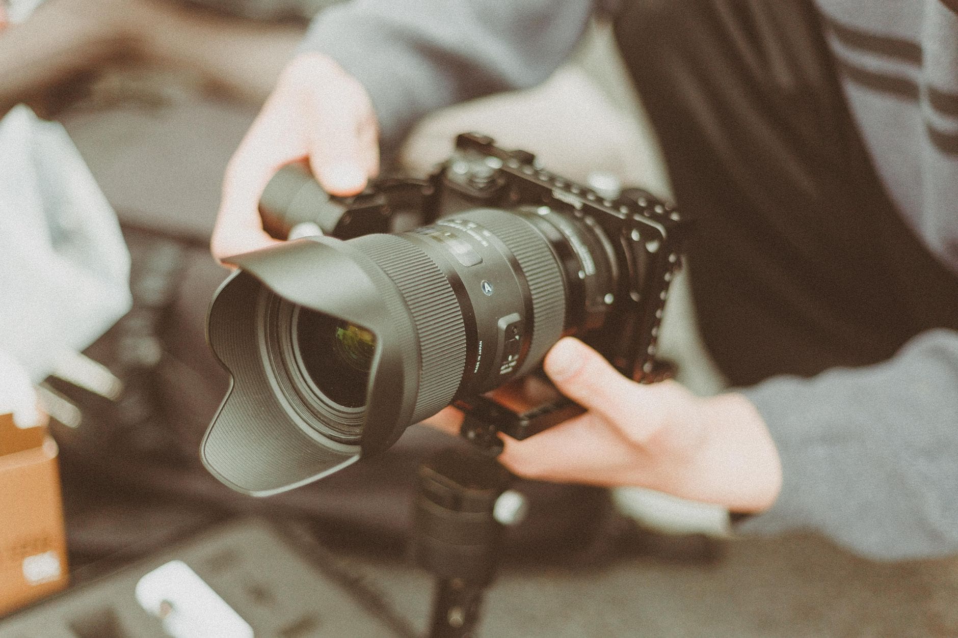 Best Camera for Filmmaking on a Budget in 2026: 5 Real Options Under $2,500 Compared 1 mirrorless camera filmmaker hands