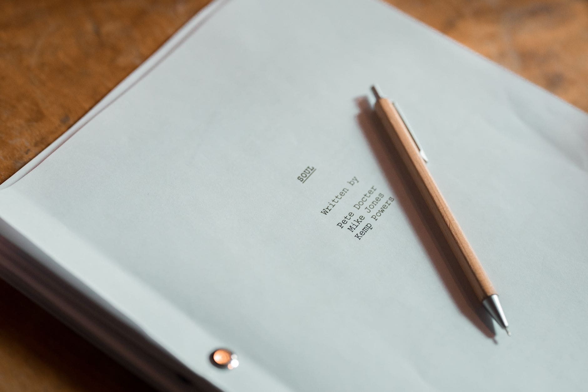 Three Act Structure in Film: How to Use It to Build Stories That Actually Work 1 film script pages closeup