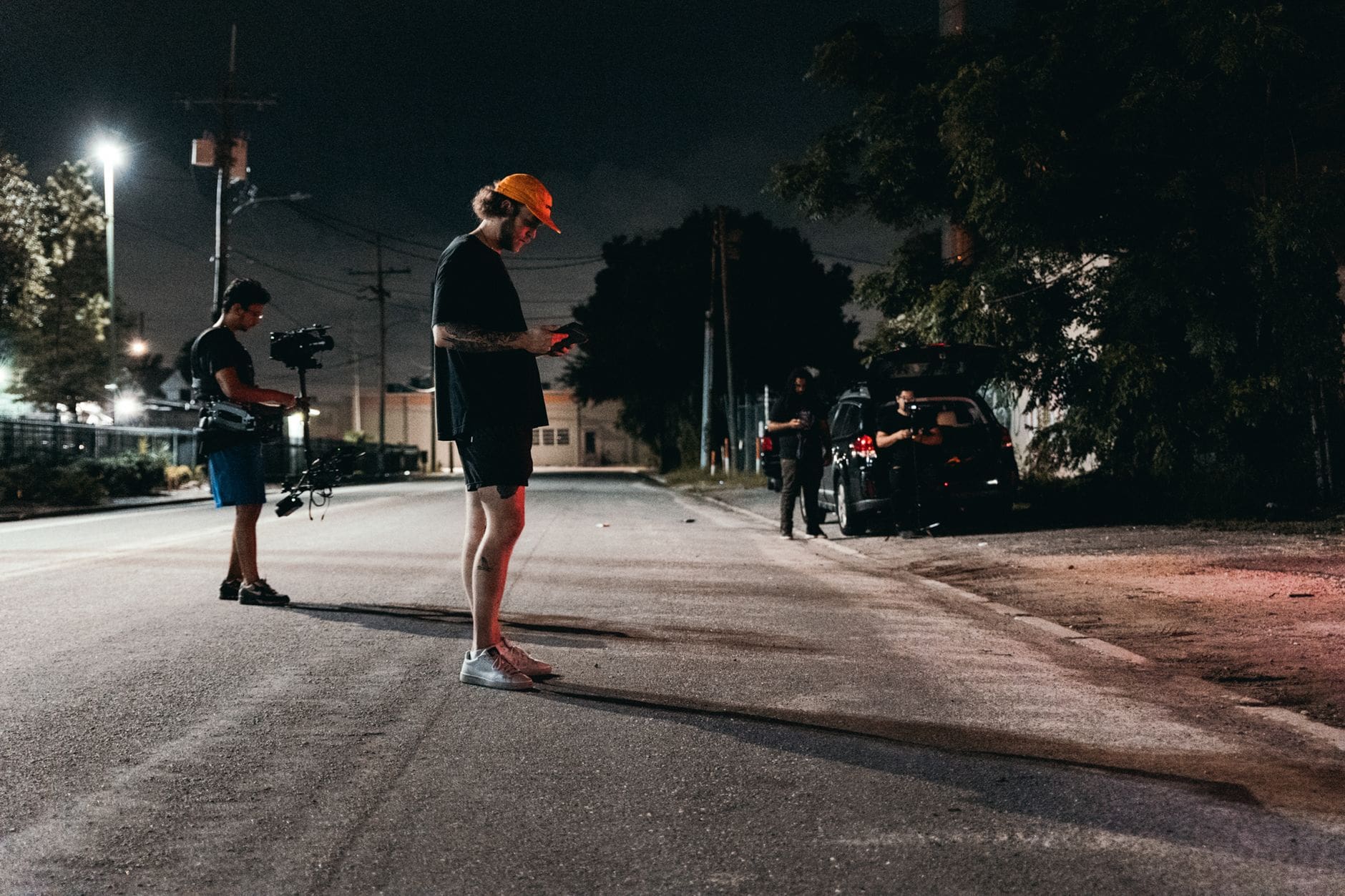 Experimental Cinematography Techniques: How to Break the Rules and Make Your Visuals Unforgettable 2 filmmaker low angle street