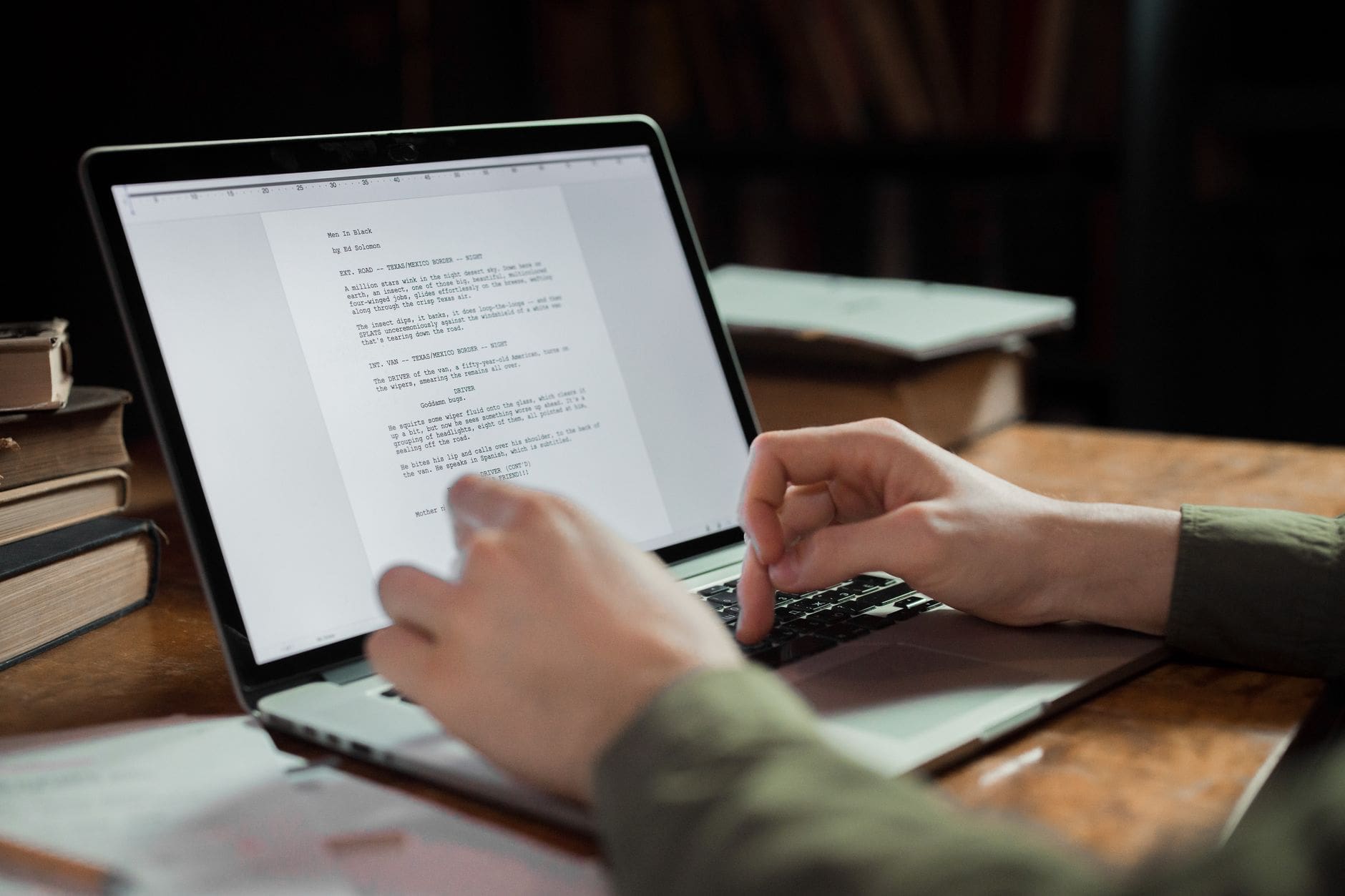Subtext in Screenwriting: How to Write What Characters Can't Say Out Loud 1 writer working on script